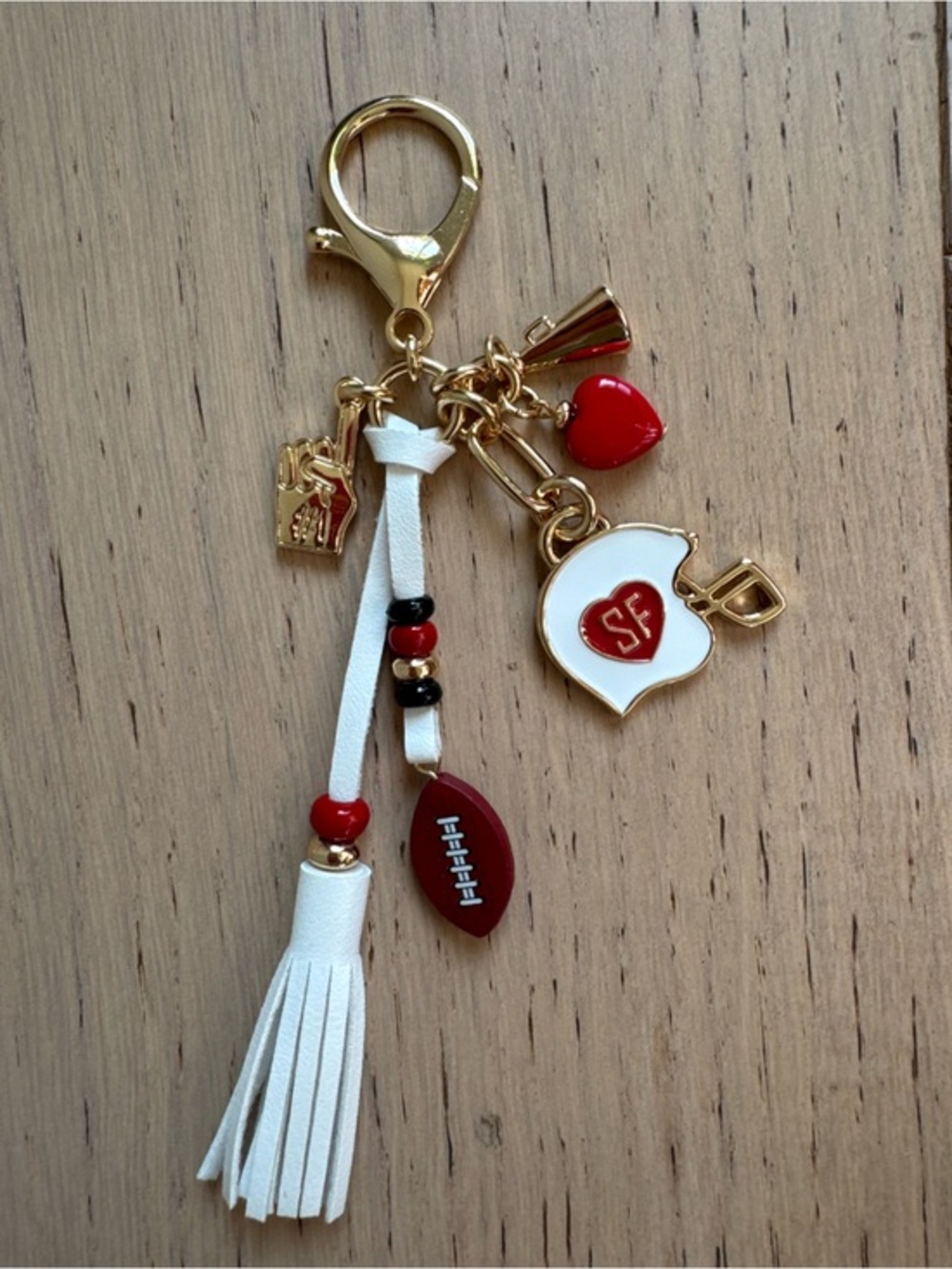ANTHROPOLOGIE FOOTBALL BAG CHARM - San Francisco White Tassel & Red Charms